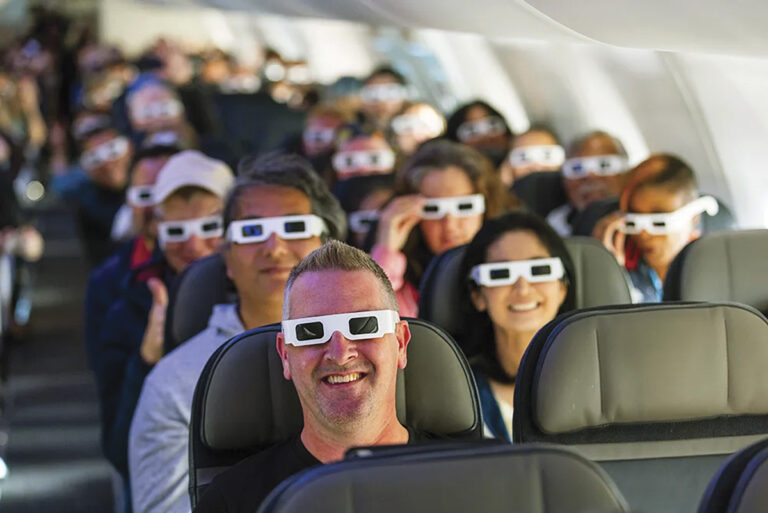 Wearing eclipse glasses gifted by Alaska Airlines, passengers watched the entire event unfold from their seats above the earth.