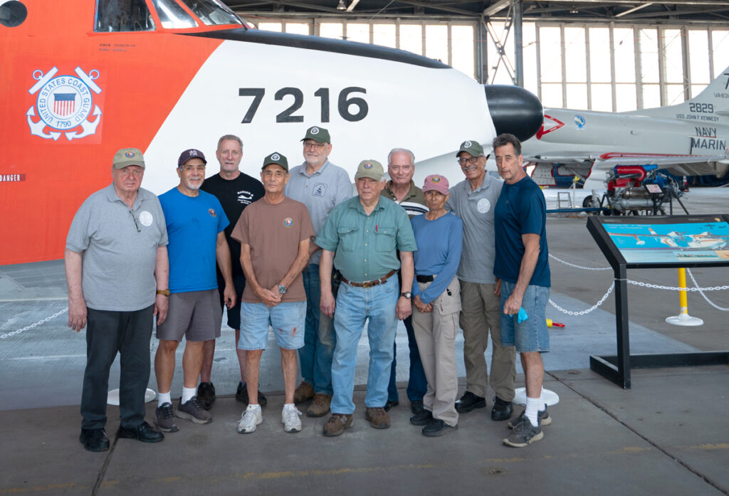 Dedicated H.A.R.P. (Historic Aircraft Restoration Project) volunteers beside a restored Grumman HU-16 Albatross,  Floyd Bennett Field, Hangar B. (Photo by Beverly Holder)