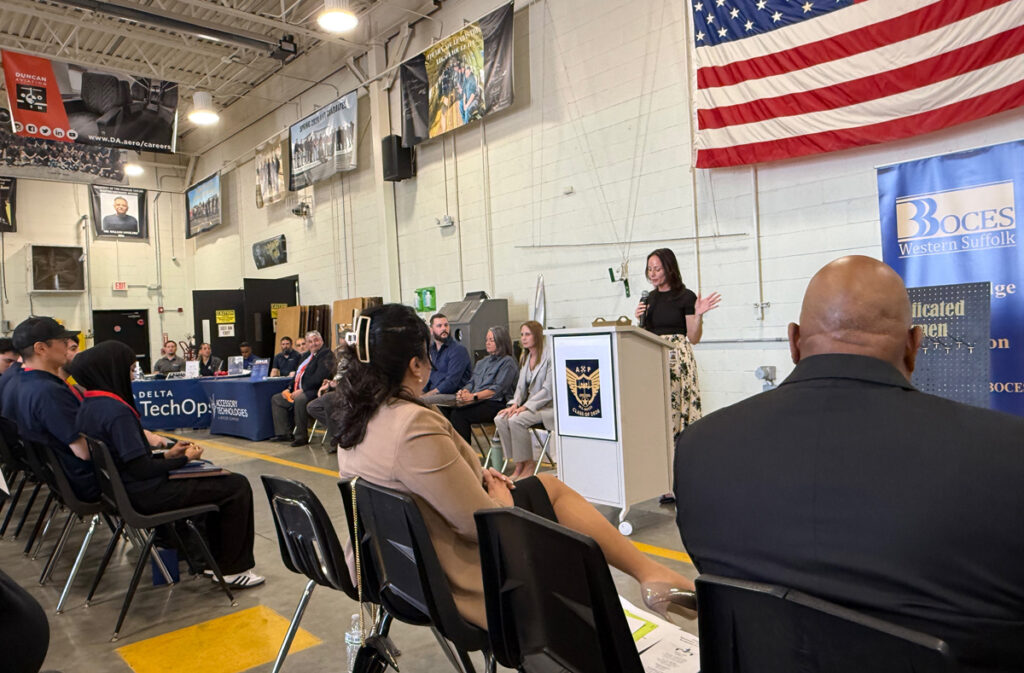 Lisa Romanowski, Principal of Western Suffolk BOCES, addresses the graduates of the class of 2026 during the Aviation Maintenance Technology Recognition Ceremony.