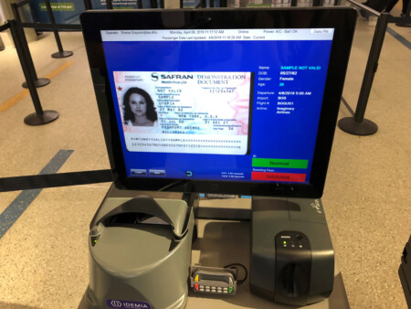 A CAT unit reads a passport that was inserted into the unit and indicates that this ID is valid as indicated by the green bar in the lower right-hand corner of the screen. (TSA photo)