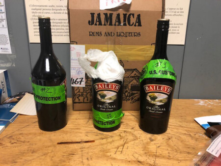 CBP at JFK Arrests Smuggler with Bottles of Cocaine Customs & Border Protection JFK Cocaine