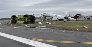The aftermath of Jazz Aviation (operating as Air Canada Express) Flight 8646 following its runway collision with an airport fire truck.