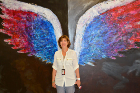 American Artist Inspires Travelers with Painted Angel Wings at Newark Liberty International Airport Diane-Papaianni
