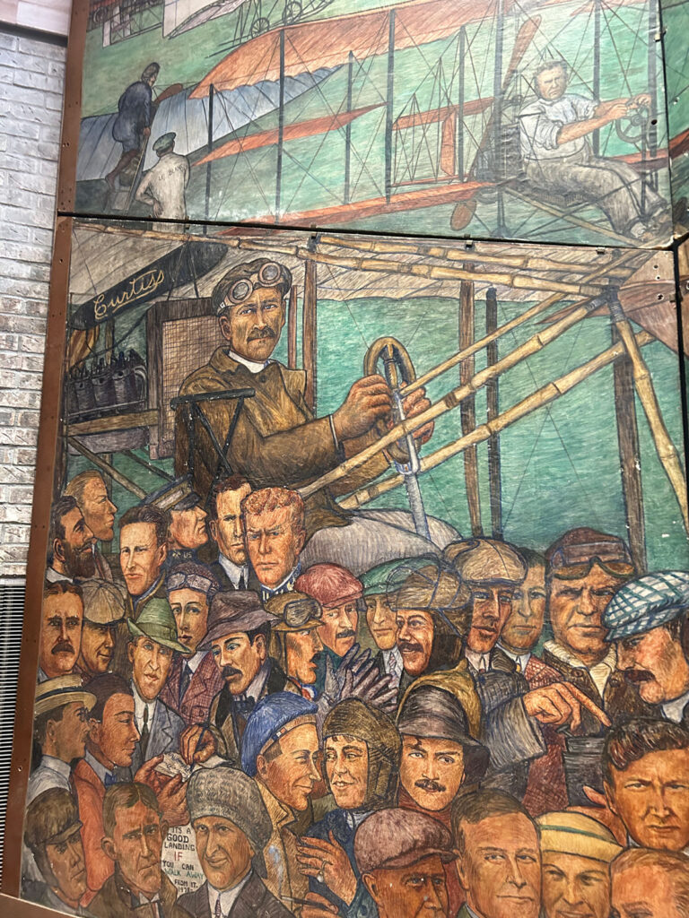 First section of Rhonie Mural with Glenn Curtiss Metropolitan Airport News