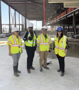 (L.-R.): Julia Lauria-Blum, Beverly Holder, Ray Ringston, and Katie Bliss, touring the construction site at T6.