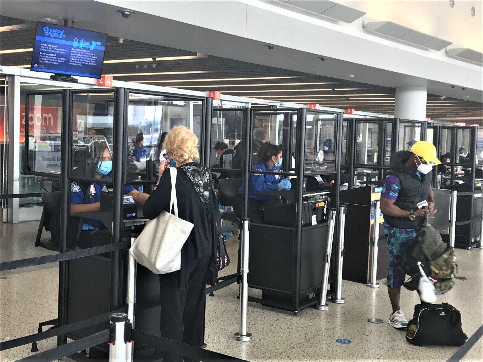 TSA is installing acrylic barriers at John F. Kennedy International Airport to help protect passengers and workforce from coronavirus