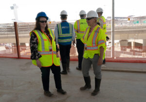 June 2024 Publisher’s Message (L.-R.): Katie Bliss and Julia Lauria-Blum touring the construction site at T6.
