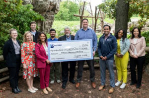 LaGuardia Gateway Partners (LGP) and Port Authority of NY and NJ (PANYNJ) present the B-INSPIRED STEM grant check to Wildlife Conservation Society (WCS) at the Queens Zoo.