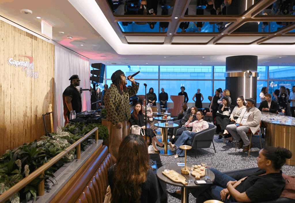 Leon Thomas performs-at the Capital One Lounge at JFK opening