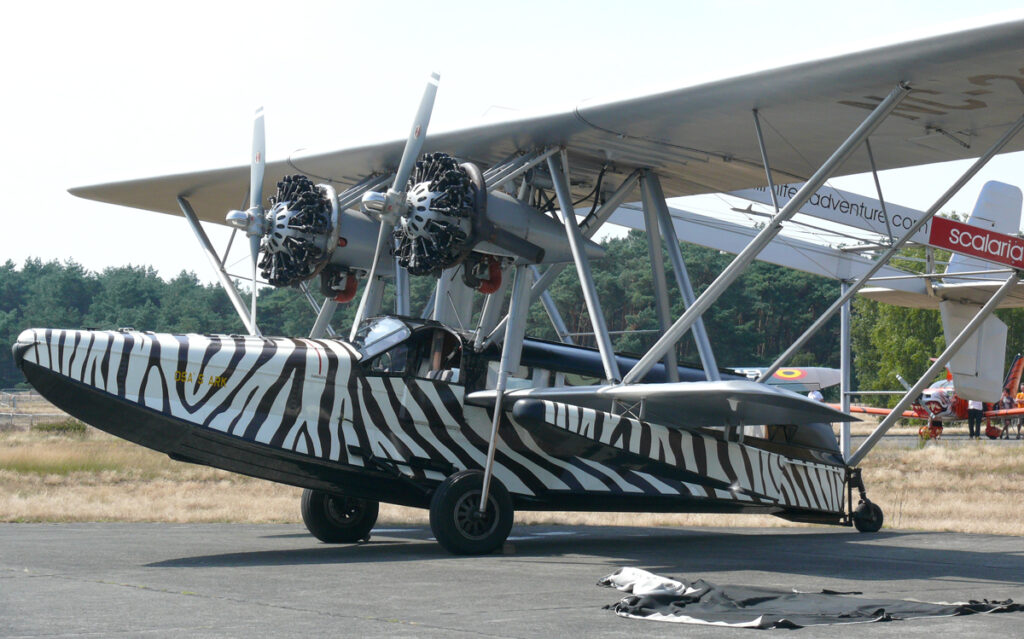 Martin and Osa Johnson’s zebra-striped S-38 'Osa's Ark' and giraffe-patterned S-39 'Spirit of Africa'—vessels of adventure as they explored the heart of Africa, creating iconic safari films and books.