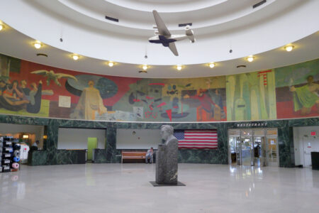 Marine Air Terminal Interior La Guardia bust and mural section Metropolitan Airport News