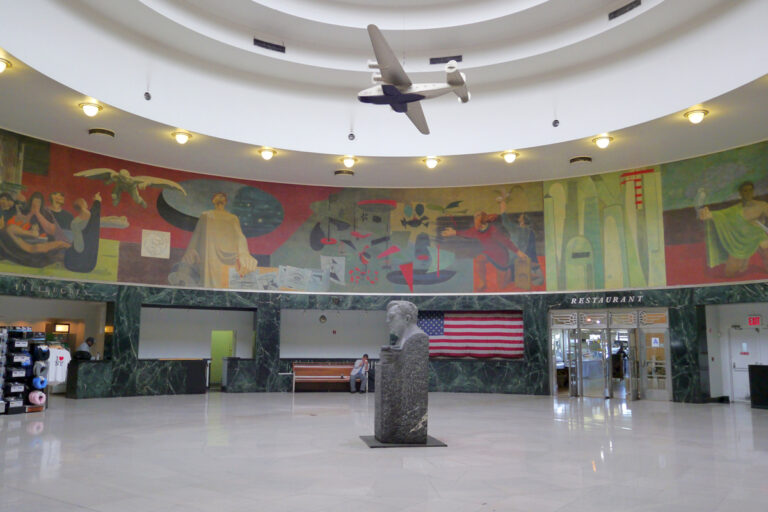 Marine Air Terminal Interior La Guardia bust and mural section Metropolitan Airport News