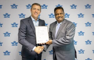 National Airlines Receives IATA IEnvA Certification Maran Ganapathy of National Airlines accepting the certificate from IATA.