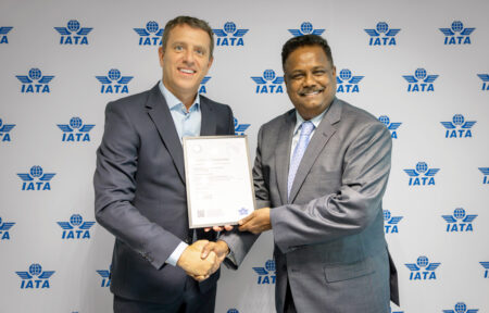 National Airlines Receives IATA IEnvA Certification Maran Ganapathy of National Airlines accepting the certificate from IATA.