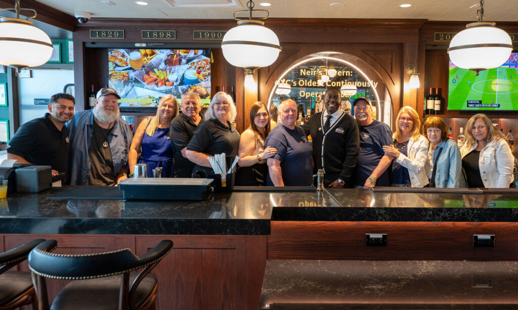 From Near-Closure to JFK Airport: The 'Miracle' Second Act of Neir’s Tavern New York Airport Woodhaven community members and Neir's Tavern Amassadors.