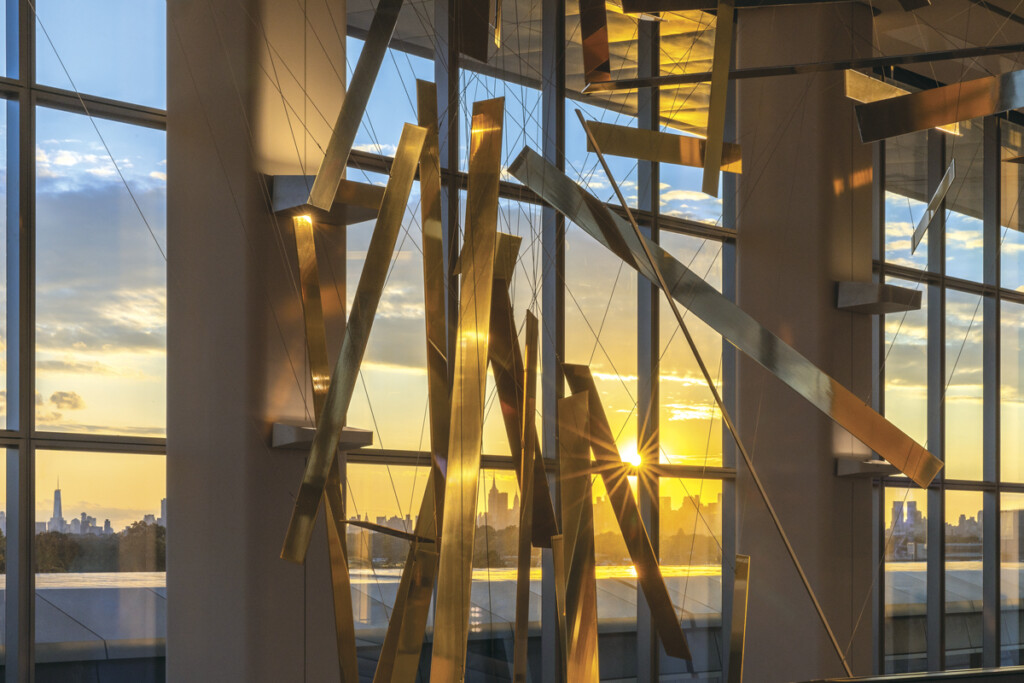 Lincoln Center and the Port Authority worked together to restore Orpheus and Apollo and to relocate the sculpture at LaGuardia Airport. The 4.5 ton sculpture consists of 188 pieces of Muntz ally connected by 450 steel wires. It is suspended from the ceiling.