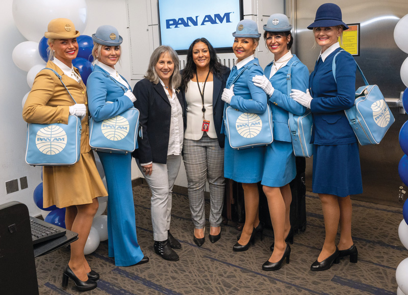 Julia Lauria-Blum, Editor in Chief, Metropolitan Airport News, and  Karen Ali, COO, JFK Millennium Partners, pose with the  Pan Am crew before takeoff.