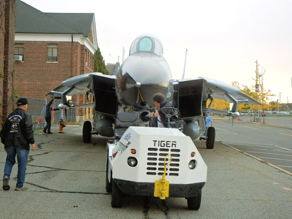 F-14D Tomcat ‘Felix 101’ Comes Home New York Airport Peter Truesdell tows the F 14 from Hangar 5 Metropolitan Airport News