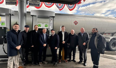 Sprague President and CEO David Glendon, and members of the New York team, stand before the grand opening of the city's first retail fuel station dispensing renewable diesel. This historic collaboration between Sprague and Sonomax signals a new era for the transportation sector, offering immediate reductions in greenhouse gases and harmful emissions with this drop-in fuel solution.