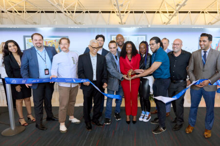 T8 artist ribbon cutting
