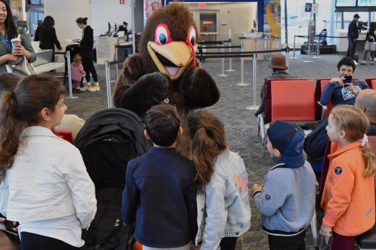 LGA Terminal-B Turkey encouraging kids to eat ONLY their vegetable!