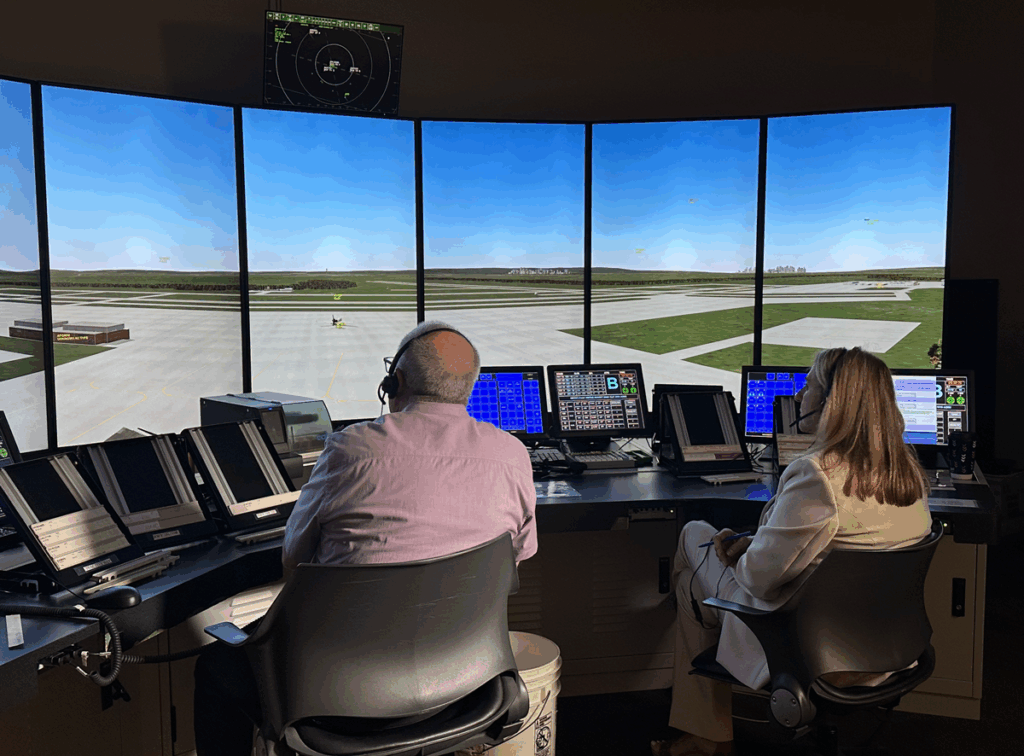 FAA Partners with Vaughn College to Address Air Traffic Controller Shortage New York Airport Vaughn Instructors Roy Kennis and Christine-West in ATC Lab.