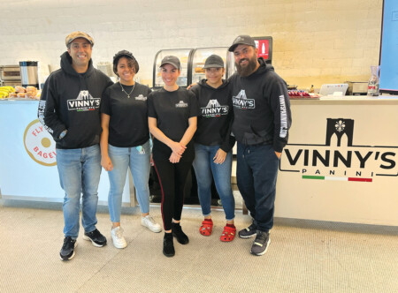 Vinny’s Panini NYC Vinny's Panini NYC team located in the TWA Hotel at JFK Airport.