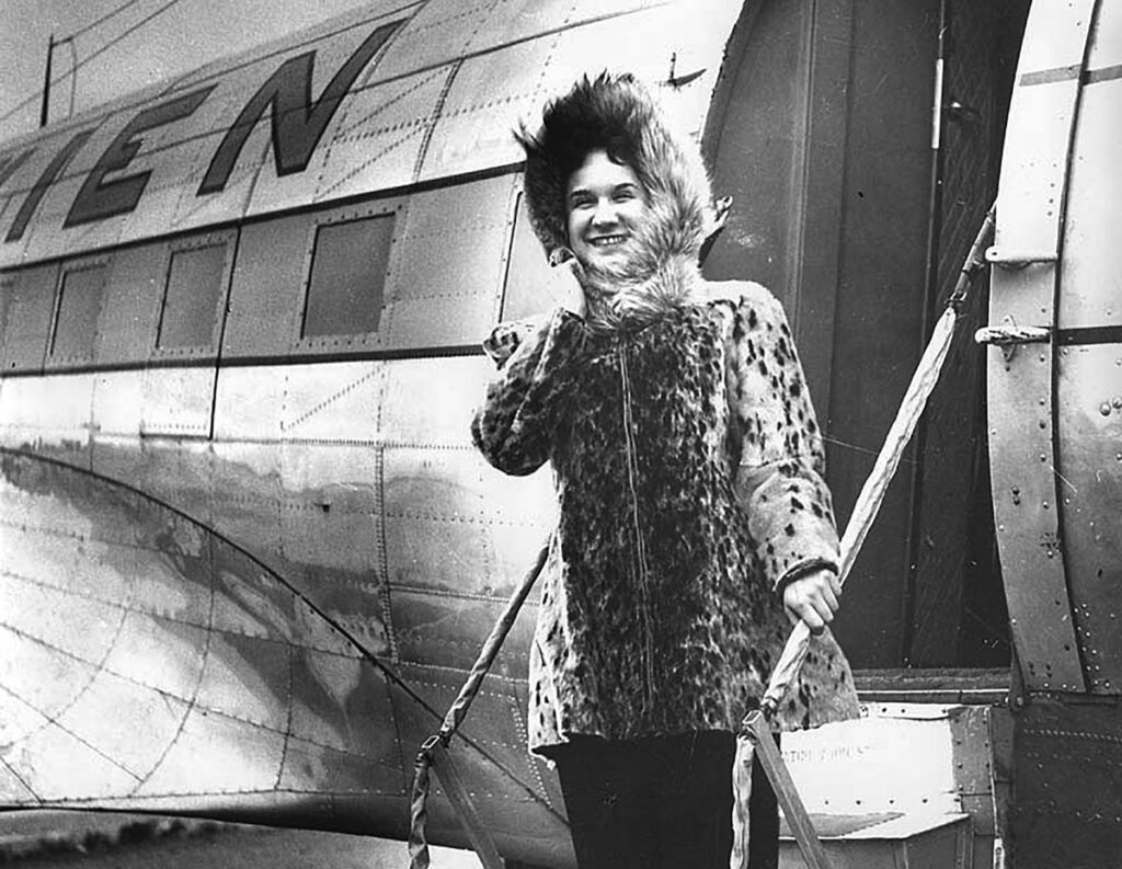 Wien stewardess dressed for the Arctic, Barrow, 1950
