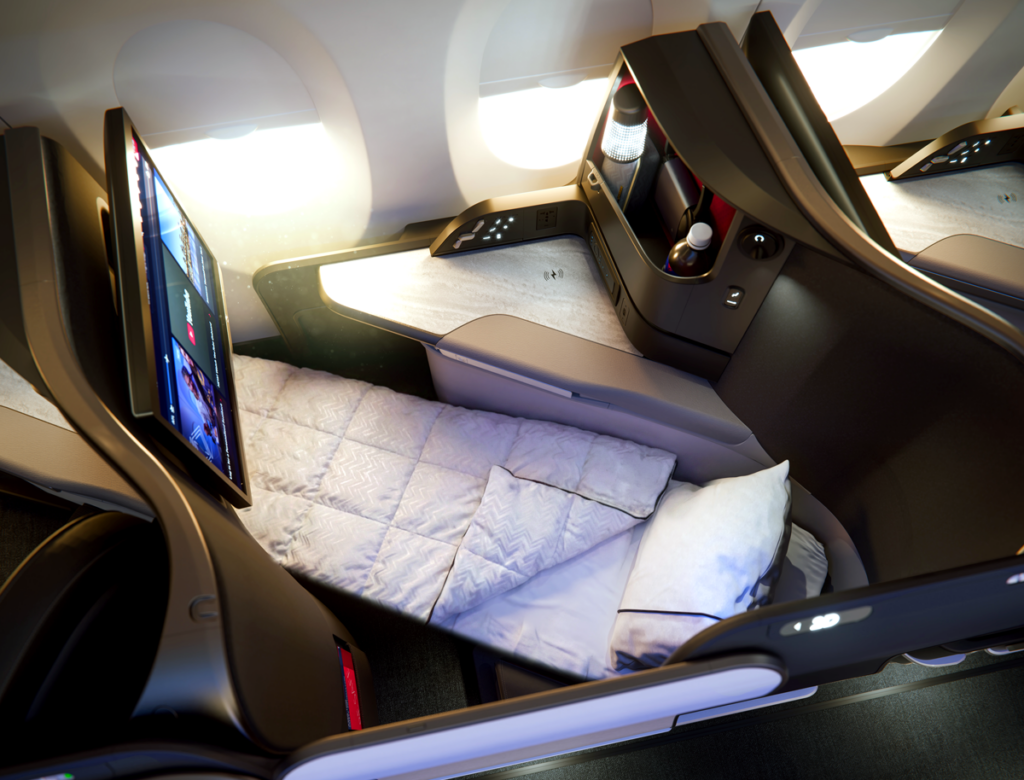 a350 1000 delta one suite seat in flatbed mode with bedding 1 Metropolitan Airport News