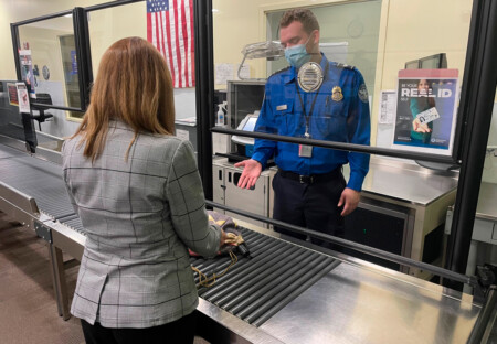 TSA Officials Commemorate 20th Anniversary of the Federalization of New York Stewart International Airport A TSA officer at New York Stewart International Airport offers some guidance to a traveler.