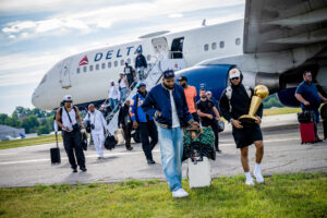 The championship-winning New York Knicks arrive at Westchester County Airport on Sunday morning following their epic Game 5 victory.